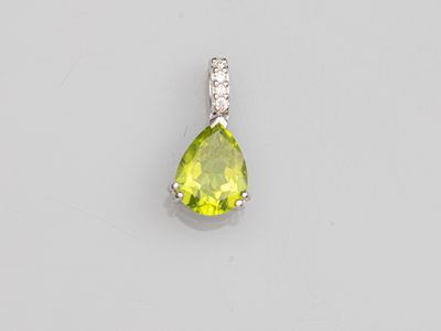 a peridot and diamond pendant