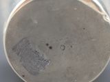 an image of a close up of a metal object on a table