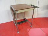 a small table with a tray on it on a red floor