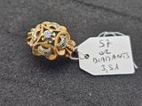 a close up of a gold and diamond ring with a price tag
