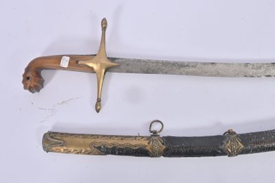 two different types of swords on display on a table