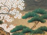 a painting on the wall of a building with a tree