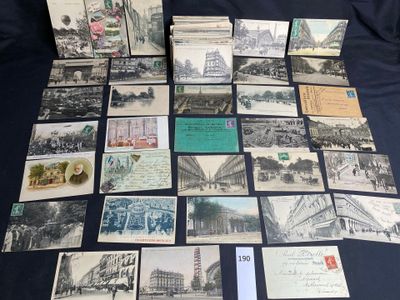 many old postcards are arranged on a table with a blue background
