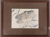 aquarelle représentant des fleurs, encadrée dans un cadre marron et accrochée à un mur blanc