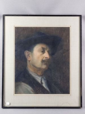 portrait of a man with a hat and a mustache in a black frame