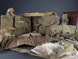 several pieces of military clothing are laid out on a table