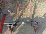 a picture of a pair of skis that are attached to a pole