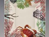 a plate with a crab and a butterfly on it