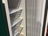 an image of an open refrigerator with the door open