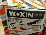 boxes of wokin screwdrivers stacked on top of each other on a table