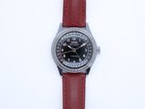 an image of a close up of a wrist watch on a white surface