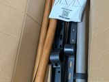a cardboard box with a bunch of tools inside of it