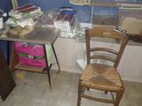 a chair and a table in a small room