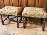 two stools that are sitting next to each other on the floor