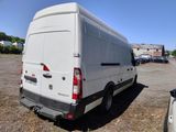 a white van that is parked in a parking lot