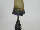 an image of a lamp with a glass shade on it
