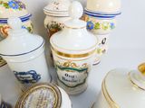 many different types of jars and containers on the table