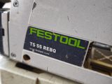 a close up of a festool machine on a table