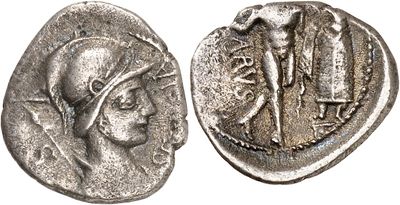 a silver coin with an image of a woman and a man on it