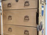an image of a chest of drawers in a room