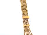 an image of a gold bracelet with a chain attached to it