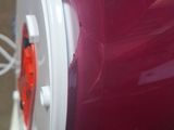 a red and white machine that is on a table
