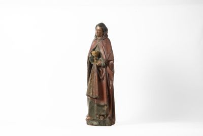 une statue représentant un homme tenant un crâne entre ses mains