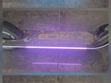 four different images of a skateboard with lights on the side of it