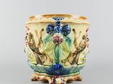 an image of a vase with a bird design on it