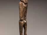 an image of a statue of a man standing on a pedestal