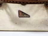 a brown and white bag with a logo on it