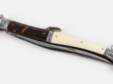 a knife that is laying on top of a table