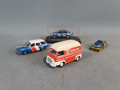 three toy cars that are sitting next to each other