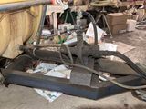 a picture of a machine that is sitting in a garage