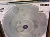 a lot of vinyl records in a box on the floor