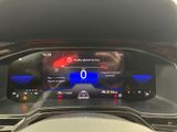 the dashboard of a car with a digital display on it