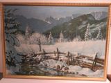 une photo d'un tableau représentant un paysage de montagne enneigé