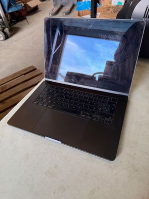 a laptop that is sitting on a table in a room