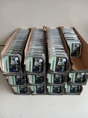 boxes of cell phones stacked on top of each other on a table