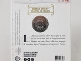 a close up of a harry potter coin on a stand