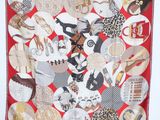 an image of a red and white scarf with many different pictures