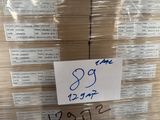 a stack of boxes with a price tag on it