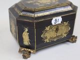 a black and gold box with a number on it