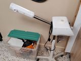 a hair dryer sitting on a table next to a mirror