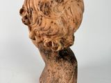 statue of a man ' s head on a white background