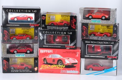 a lot of red toy cars in boxes on a white surface