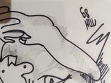 a drawing of a hand holding a dog and a cat