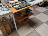 a table with a lot of electronics on top of it