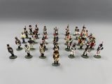 a close up of a group of toy soldiers on a white surface
