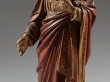 une image représentant une statue de Jésus debout sur un piédestal